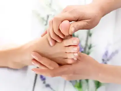 Feet resting on a soft blanket