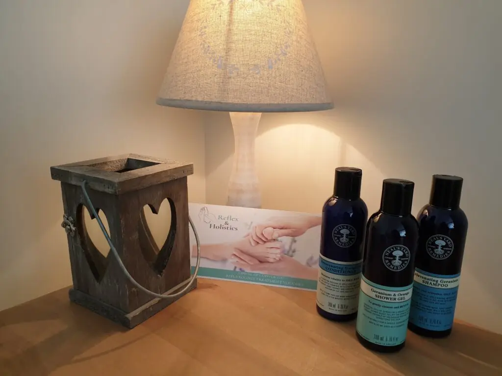 Geranium shampoo, conditioner and shower gel with a reflexology voucher